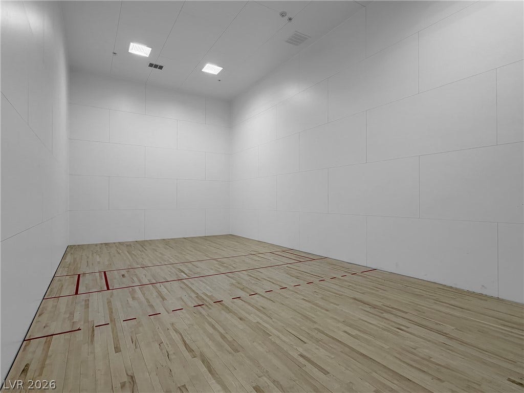 771 White Dogwood Court, Las Vegas, NV 89148 A private racquetball court awaits your competitive spirit.