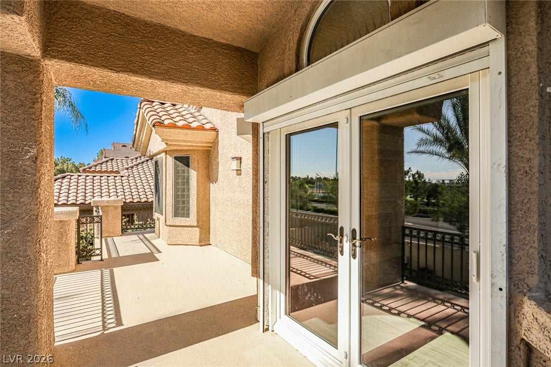 1828 Dolce Drive, Las Vegas, NV 89134 A private balcony offers serene views and an inviting outdoor retreat.