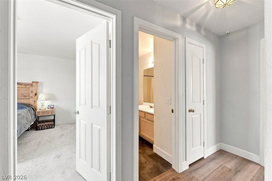 505 Rafkin Place, Henderson, NV 89052 A well-lit corridor provides access to a tranquil bedroom and with LVP flooring in the hall area