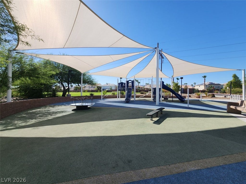505 Rafkin Place, Henderson, NV 89052 A vibrant community playground close by provides endless outdoor recreation under broad shade canopies.
