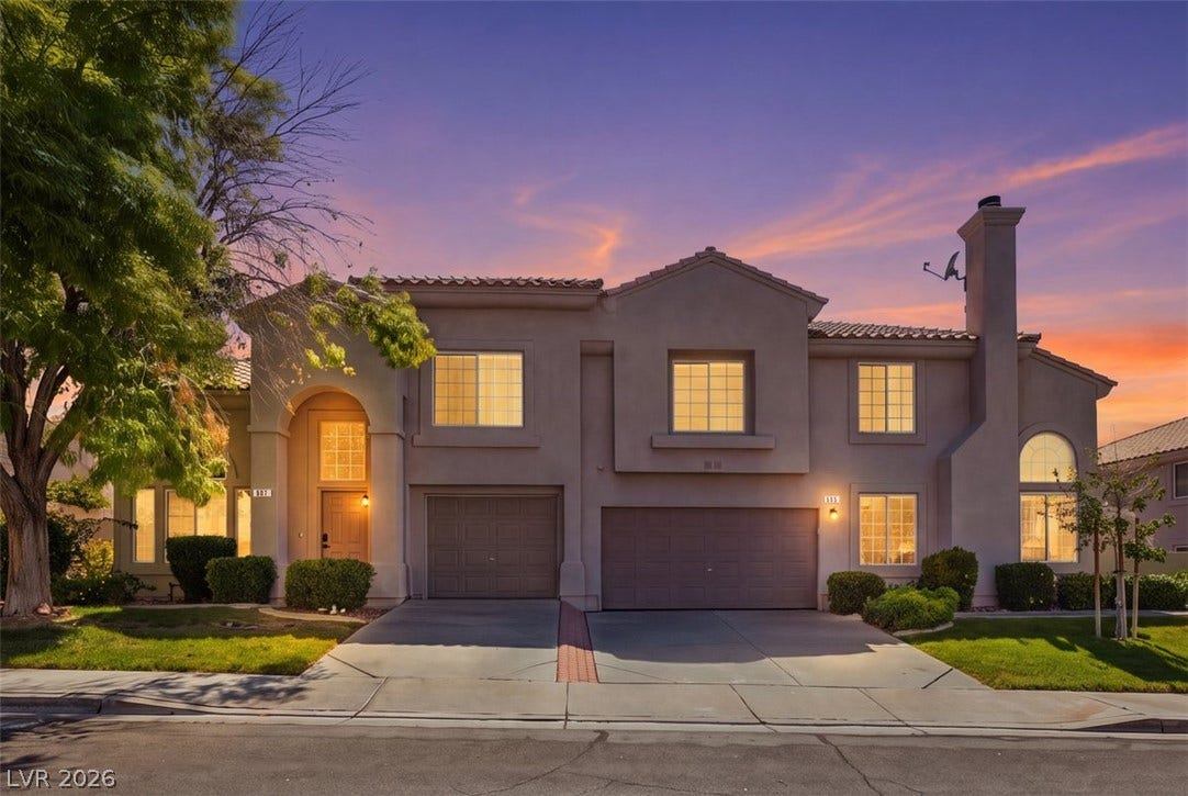 505 Rafkin Place, Henderson, NV 89052 An inviting exterior and manicured landscaping under a vibrant twilight sky.