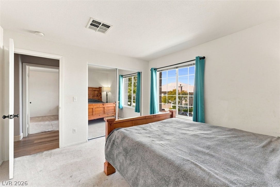 505 Rafkin Place, Henderson, NV 89052 Well-lit sleeping quarters with broad windows providing neighborhood views.
