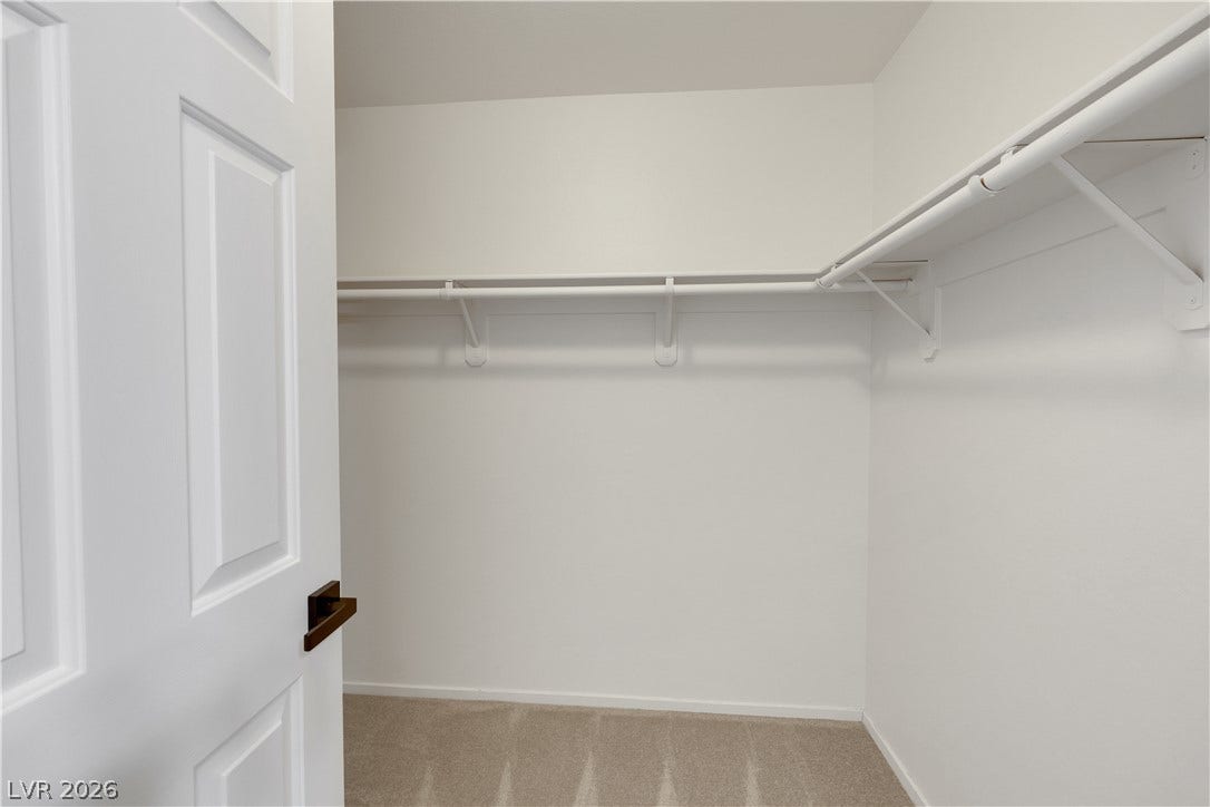 648 Moonlight Mesa Drive, Henderson, NV 89011 Ample shelving and hanging space defines this generously sized walk-in closet.