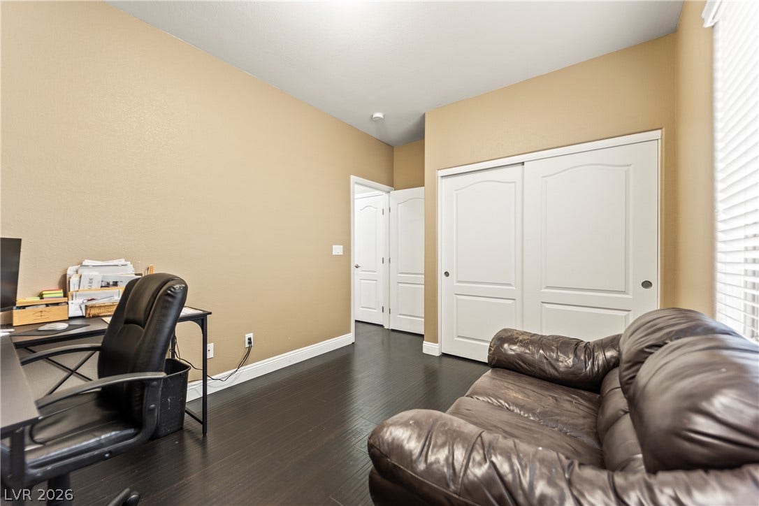 7337 Picnic Hill Street, Las Vegas, NV 89166 A versatile study or guest space features durable dark wood flooring and ample closet storage.
