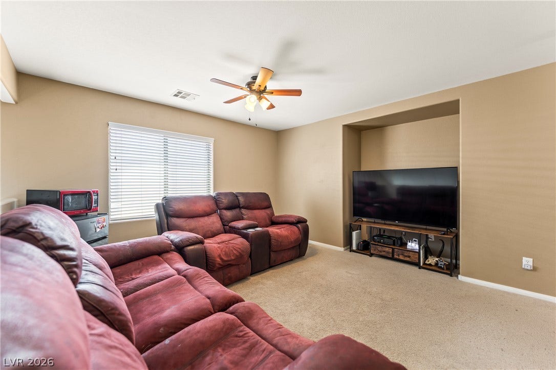 7337 Picnic Hill Street, Las Vegas, NV 89166 A comfortable Loft with a ceiling fan offers a relaxing space for everyday living.