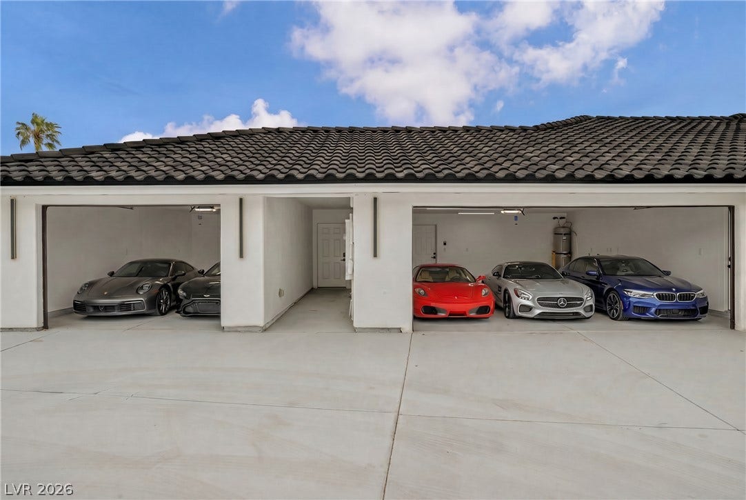 3630 Tobias Lane, Las Vegas, NV 89120 Secure, multi-vehicle garage bays provide ample space for a prized car collection.