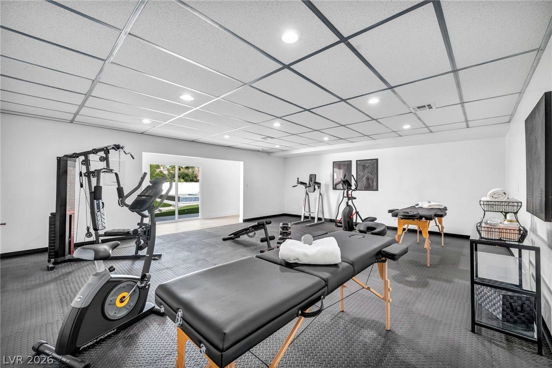 3630 Tobias Lane, Las Vegas, NV 89120 An ideal exercise room features resilient rubber flooring and ample space for fitness equipment.