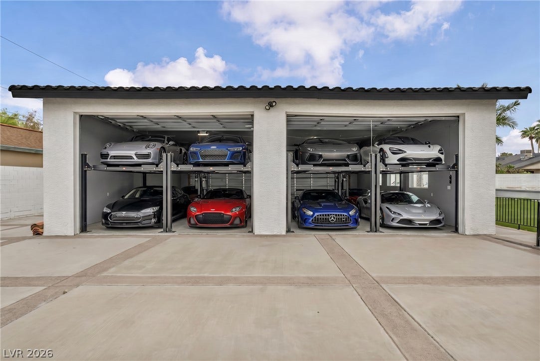 3630 Tobias Lane, Las Vegas, NV 89120 Secure, multi-level garage bays provide ample space for a premier vehicle collection.