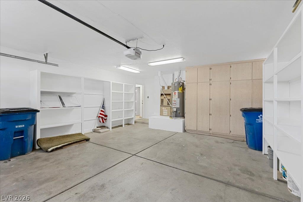 2000 Silverton Drive, Henderson, NV 89074 A capacious garage offers extensive built-in shelving and ample storage options.