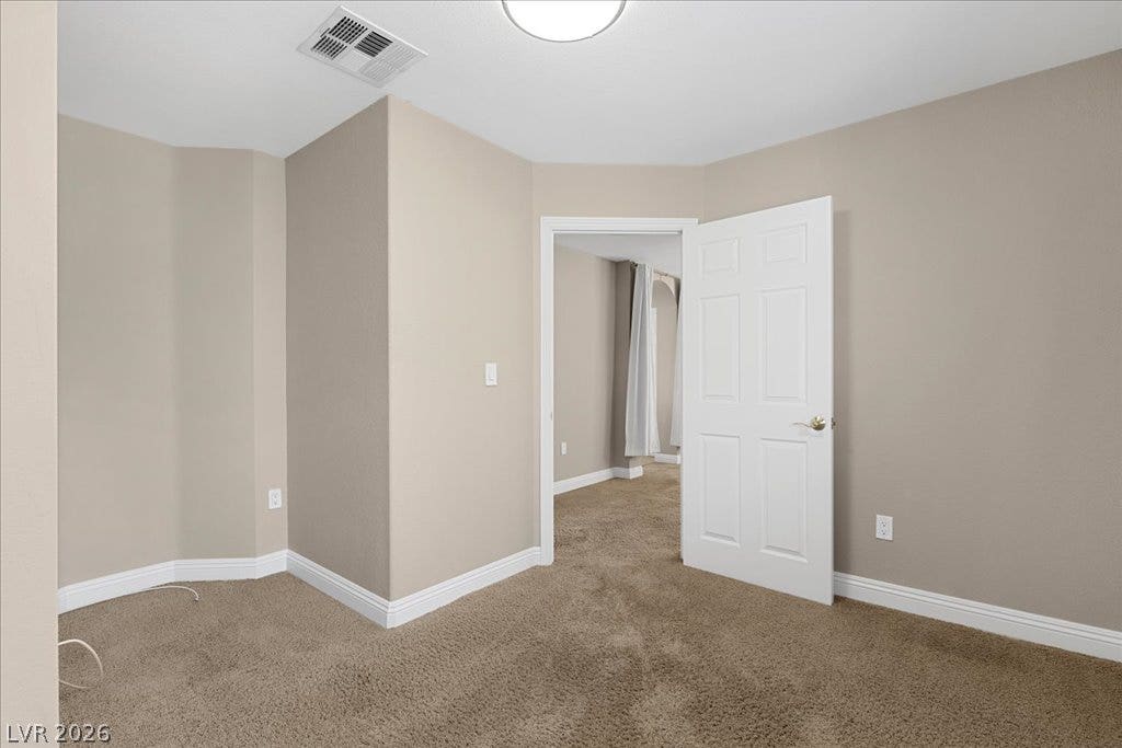 2000 Silverton Drive, Henderson, NV 89074 Warmly painted walls and plush carpeting create a cozy and inviting atmosphere in this flexible space.