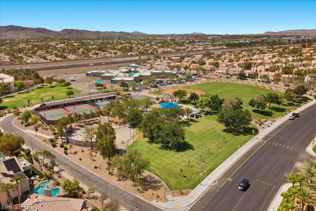 2000 Silverton Drive, Henderson, NV 89074 An aerial perspective reveals a vibrant community park with extensive green spaces and recreational amenities.