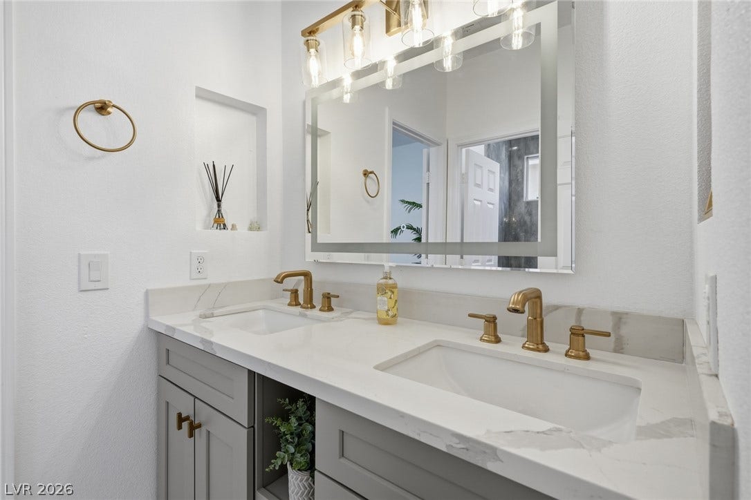 9615 Sedona Hills Court, Las Vegas, NV 89147 Luxurious dual vanities offer both elegance and convenience for modern living.