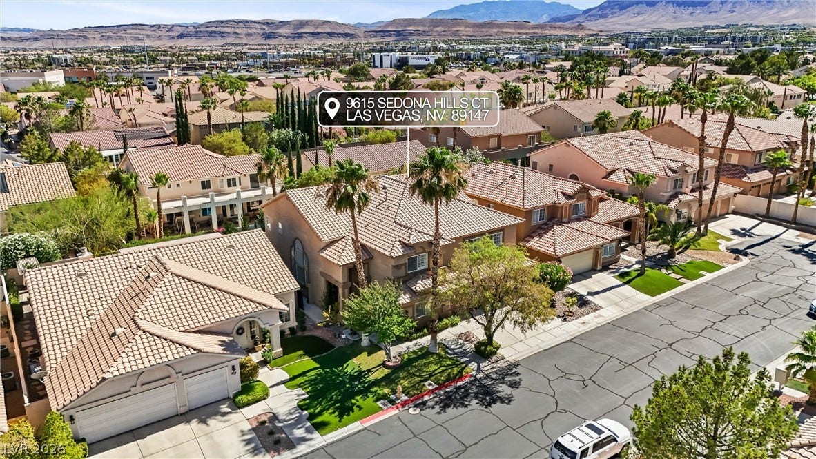 9615 Sedona Hills Court, Las Vegas, NV 89147 An aerial perspective reveals a charming residential neighborhood with mature landscaping and well-maintained properties.
