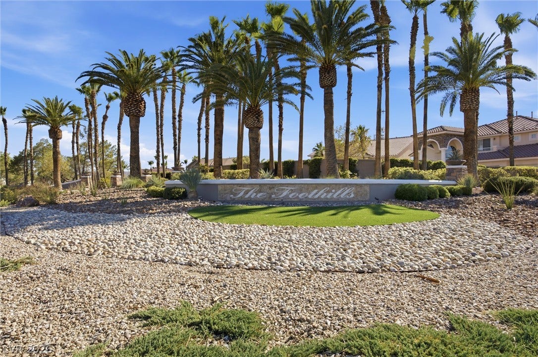 9615 Sedona Hills Court, Las Vegas, NV 89147 Enter "The Foothills," a community adorned with towering palm trees and meticulously maintained landscaping.