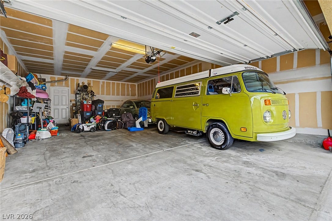 Ample garage space for vehicles and storage.