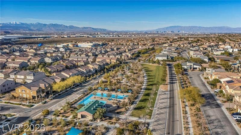 Panoramic mountain and city skyline views frame this planned neighborhood with community parks and pools.