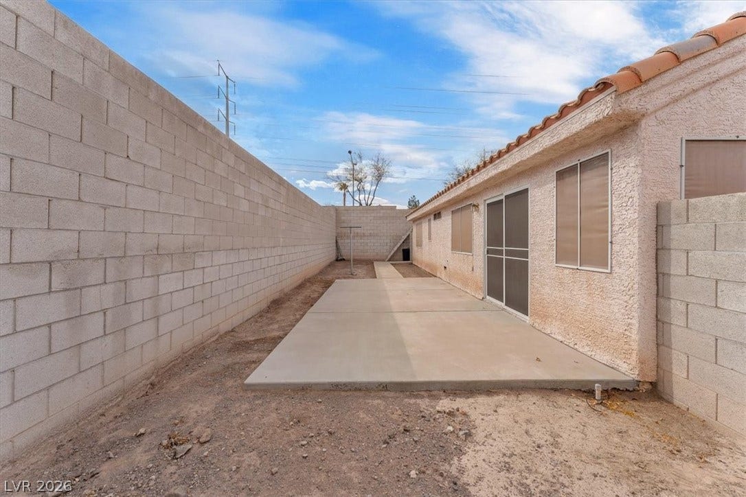 1163 Teal Point Drive, Henderson, NV 89074 View of yard with a patio area and a fenced backyard