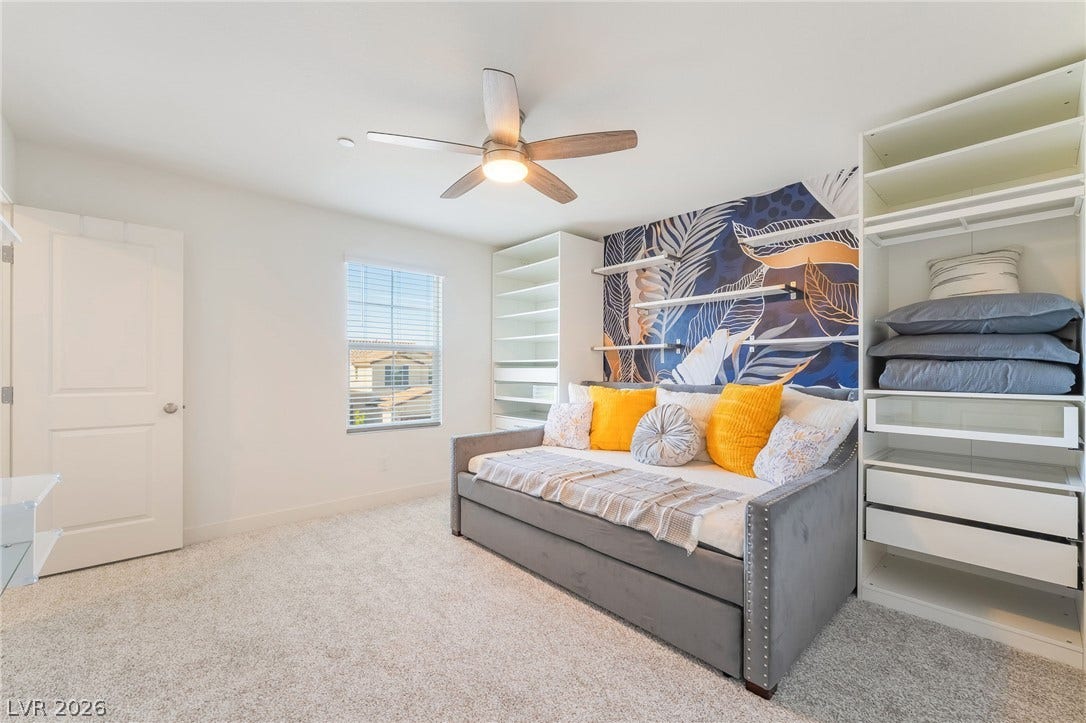 2966 Gallarate Drive, Henderson, NV 89044 A versatile bedroom features a daybed and integrated storage solutions.