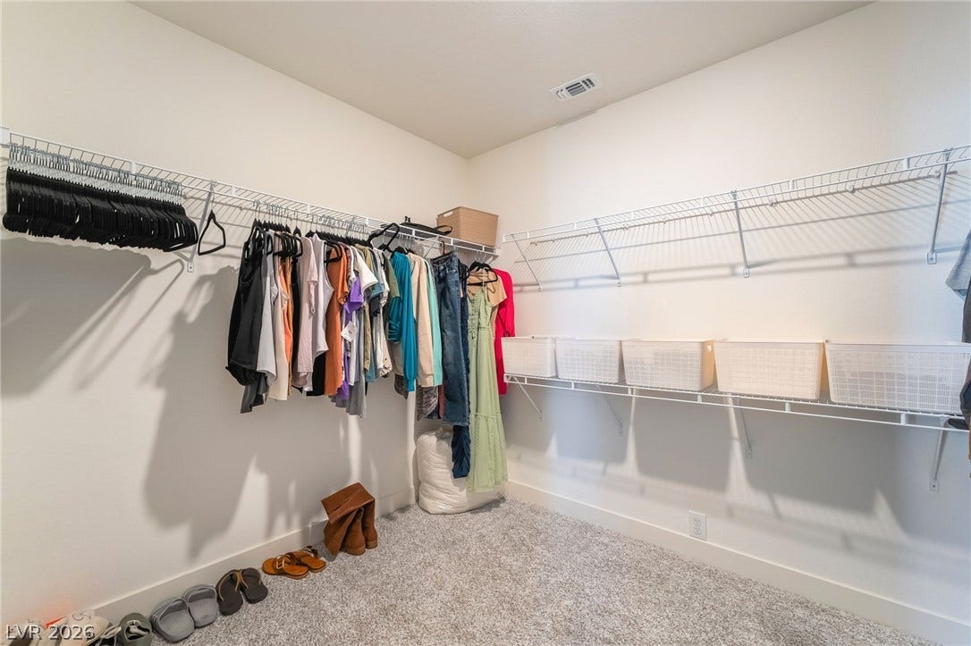 2966 Gallarate Drive, Henderson, NV 89044 A well-organized walk-in closet offers ample storage space with wire shelving.