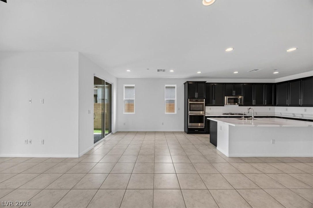 An open concept design seamlessly merges living spaces, creating an ideal setting for modern living and entertaining.