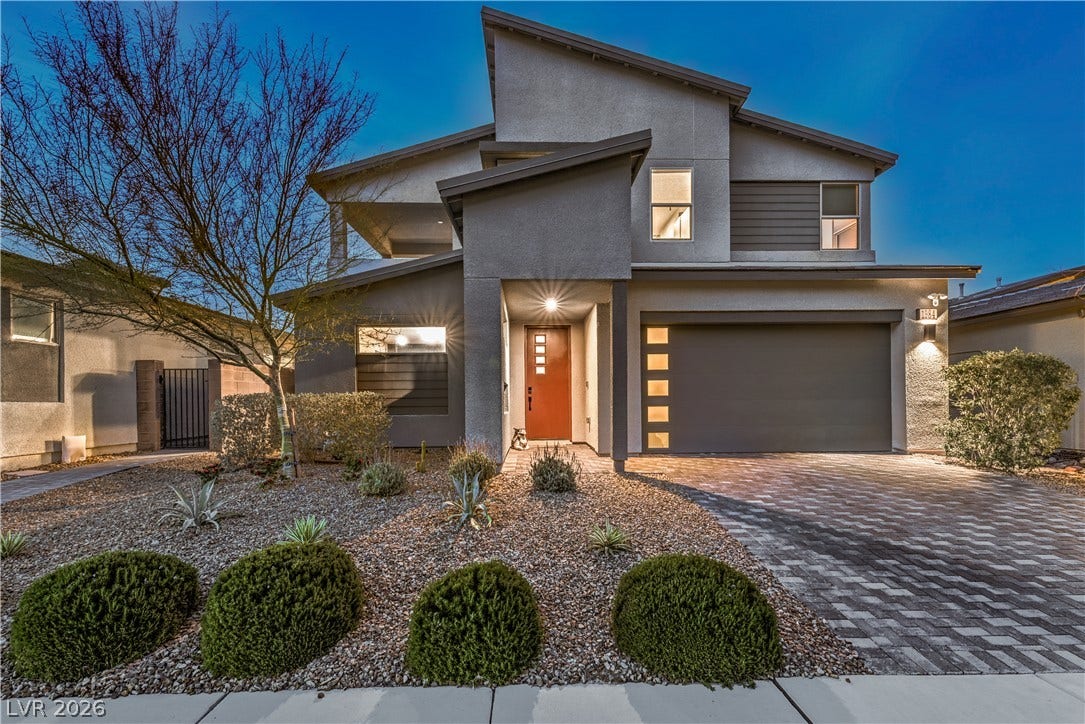 1984 Canyon Highlands Drive, Henderson, NV 89052 A modern facade with striking architectural lines and a paver driveway welcomes you home.