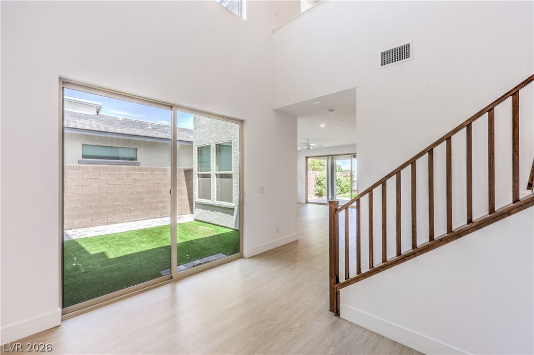 1984 Canyon Highlands Drive, Henderson, NV 89052 A spacious, airy interior features abundant natural light and sleek, modern finishes.
