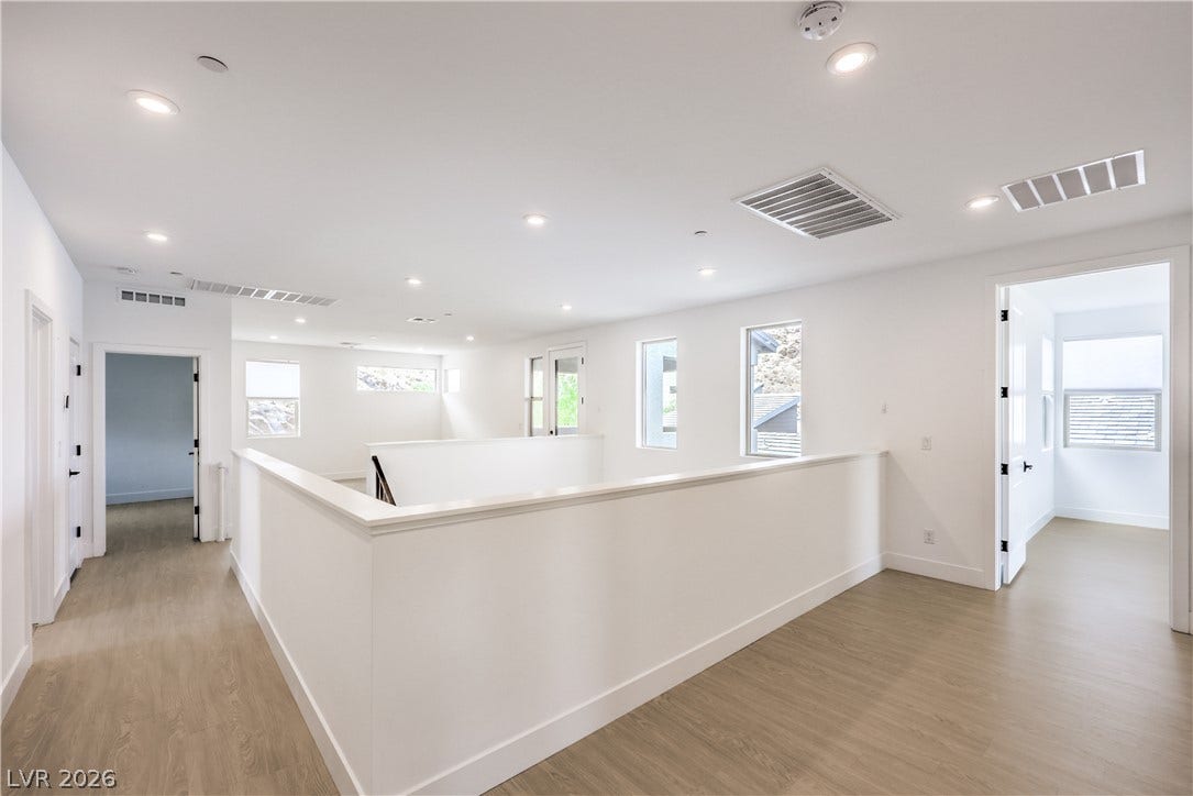 1984 Canyon Highlands Drive, Henderson, NV 89052 An open and airy upstairs landing with abundant natural light and modern recessed lighting.