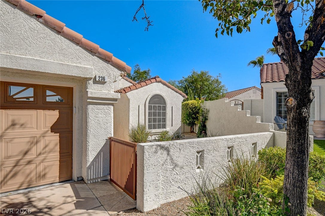 236 Misty Garden Street, Henderson, NV 89012 Tiled roofs and stucco exterior walls create classic Southwest character.