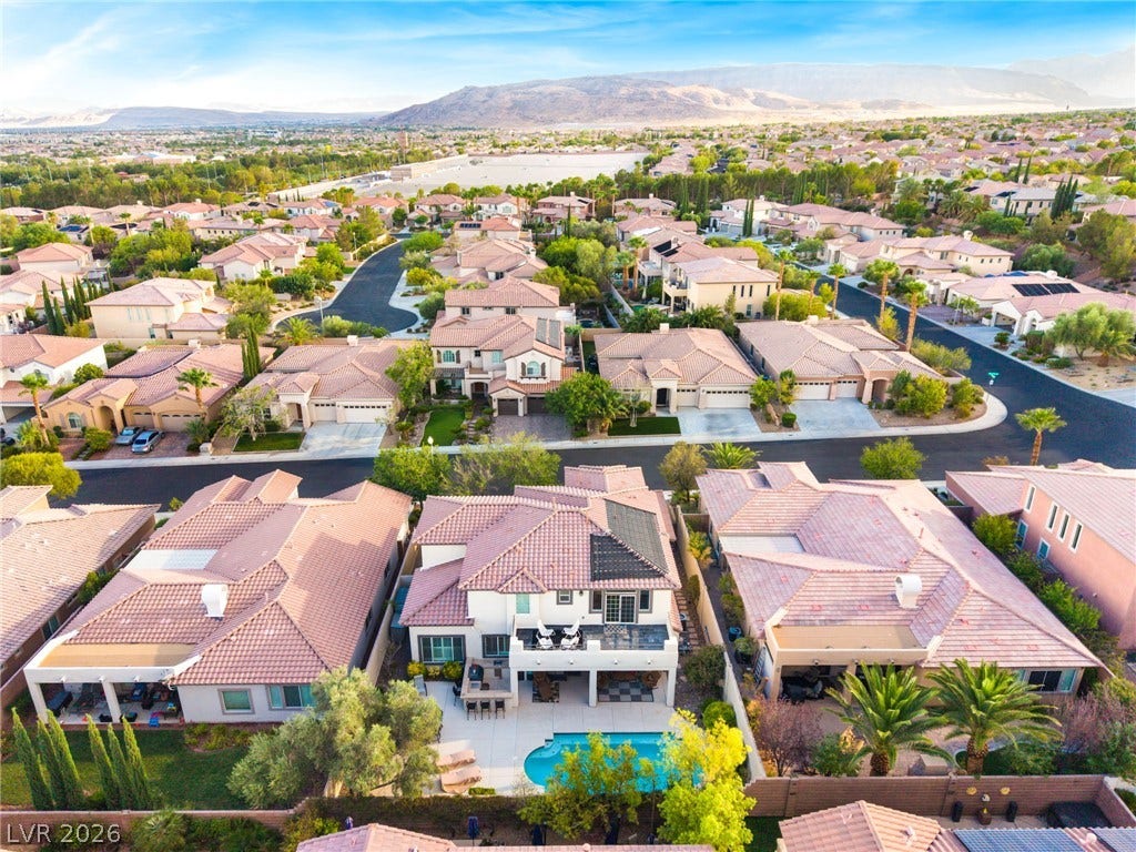 11416 Rancho Portena Avenue, Las Vegas, NV 89138 Nestled within a desirable neighborhood, this property offers a sparkling private pool and mountain views.