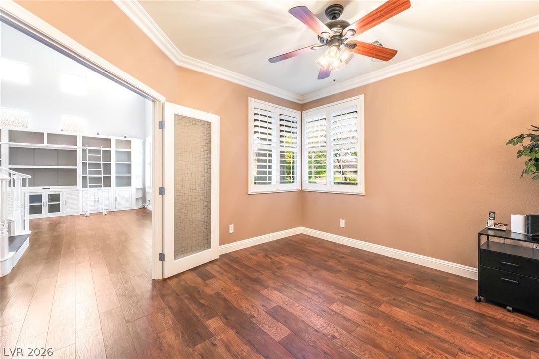 11416 Rancho Portena Avenue, Las Vegas, NV 89138 Gleaming hardwood floors and classic crown molding define this versatile office space.