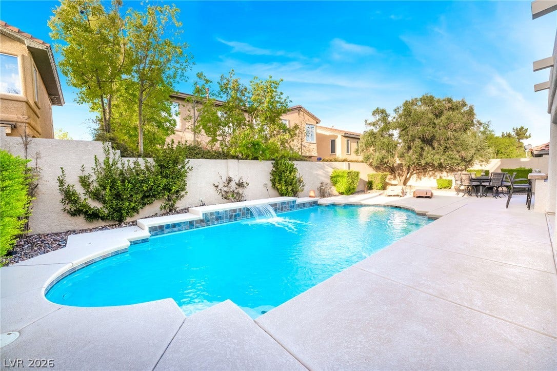 11416 Rancho Portena Avenue, Las Vegas, NV 89138 A sparkling swimming pool highlights this spacious backyard surrounded by block walls and mature trees.