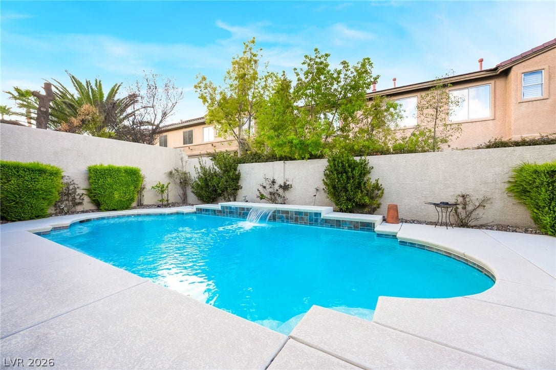 11416 Rancho Portena Avenue, Las Vegas, NV 89138 A sparkling swimming pool is surrounded by a spacious concrete patio and privacy walls.