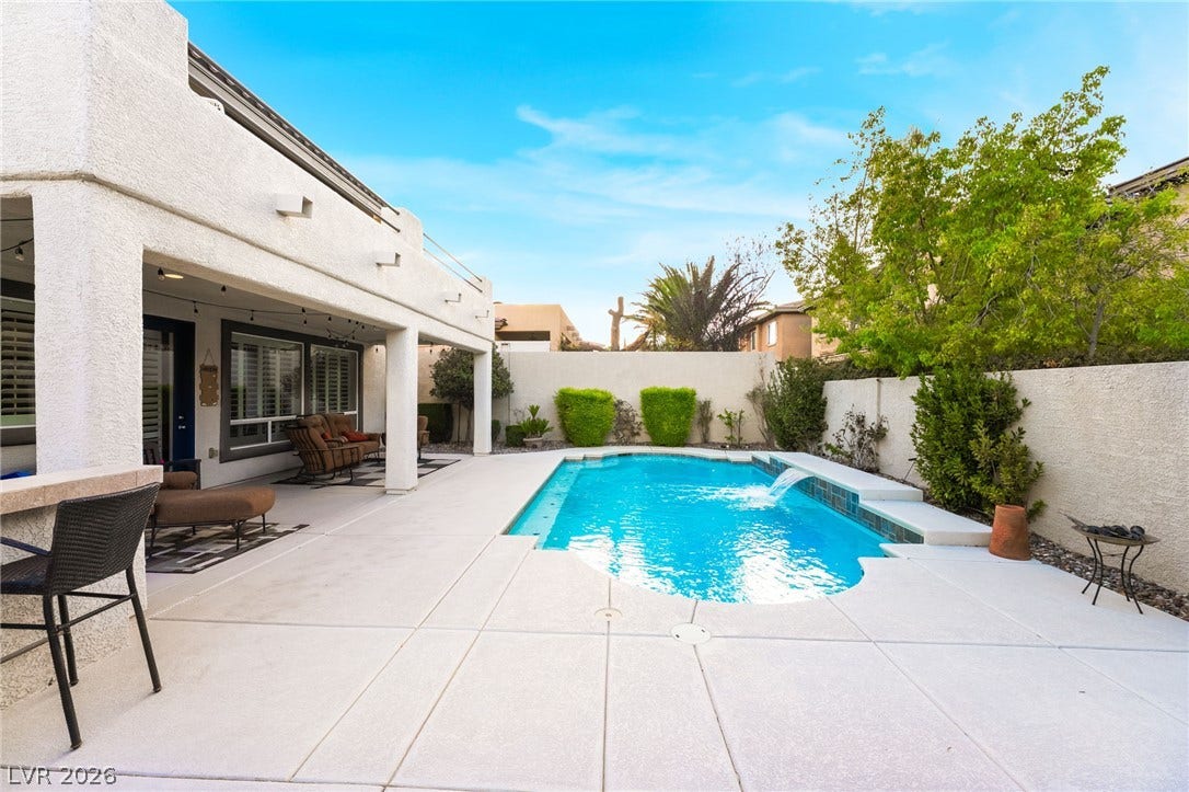 11416 Rancho Portena Avenue, Las Vegas, NV 89138 A sparkling in-ground pool serves as the centerpiece of this private, stucco-walled backyard retreat.