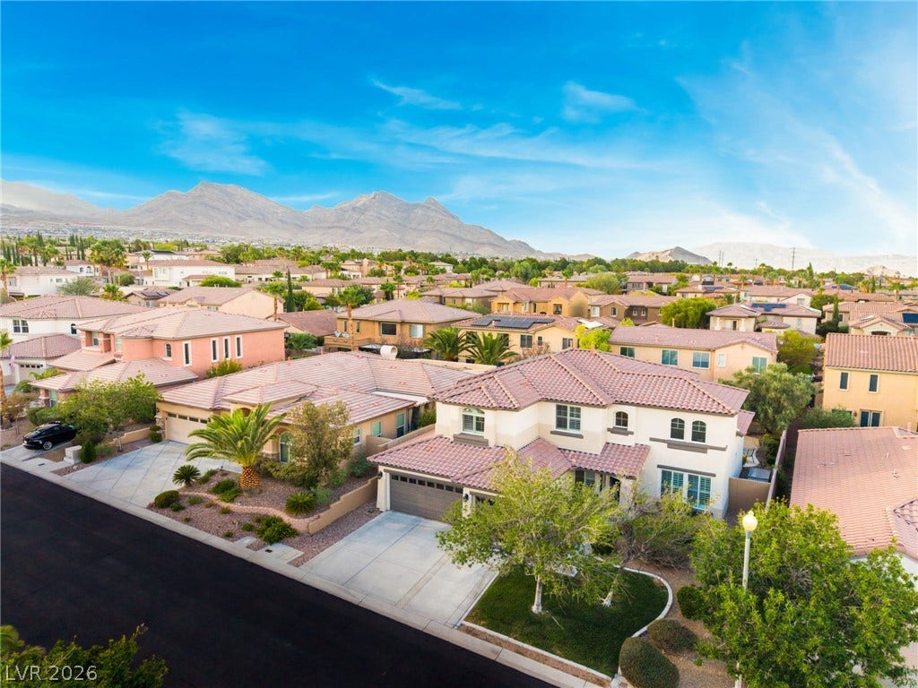 11416 Rancho Portena Avenue, Las Vegas, NV 89138 Majestic mountain ridges provide a dramatic backdrop for this multi-level suburban neighborhood.