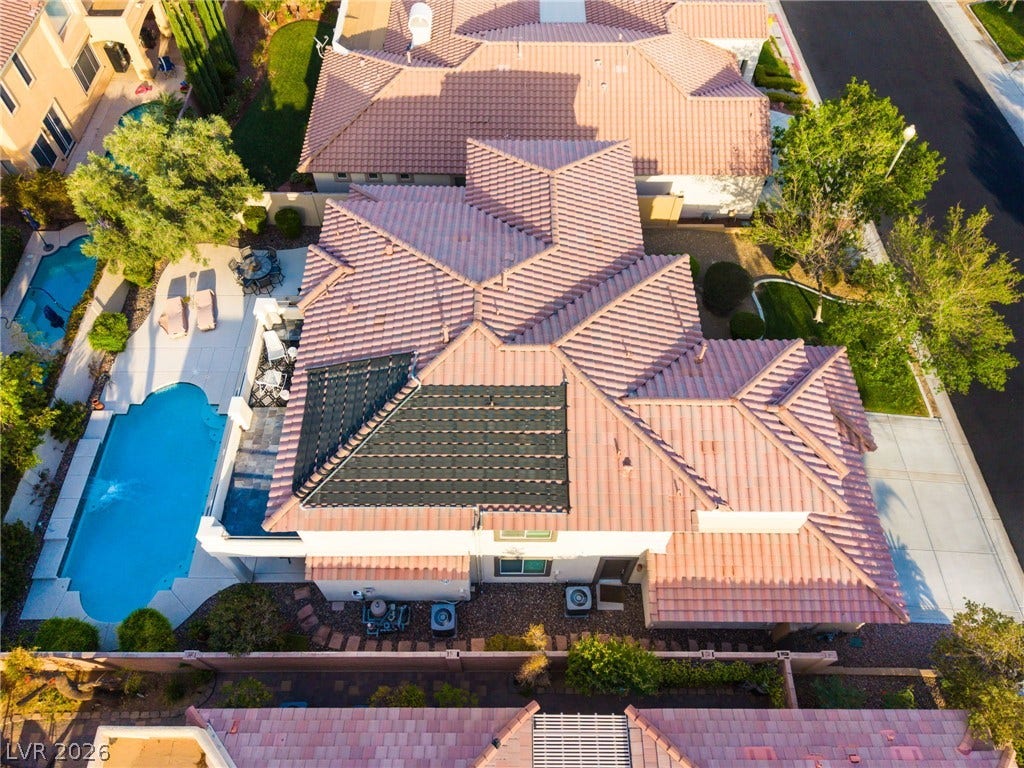 11416 Rancho Portena Avenue, Las Vegas, NV 89138 Classic tile roofing highlights the structured multi-gabled design of this suburban home.