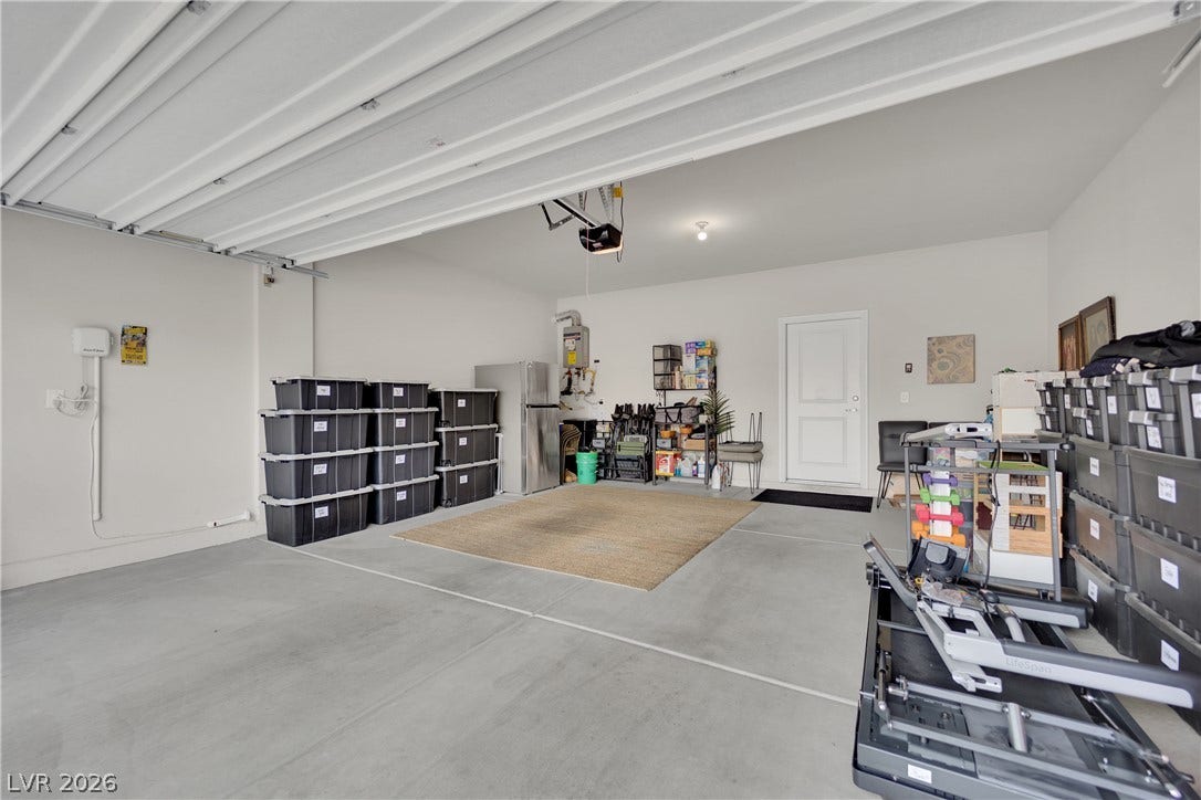 A spacious and practical garage offers ample room for storage and organization.