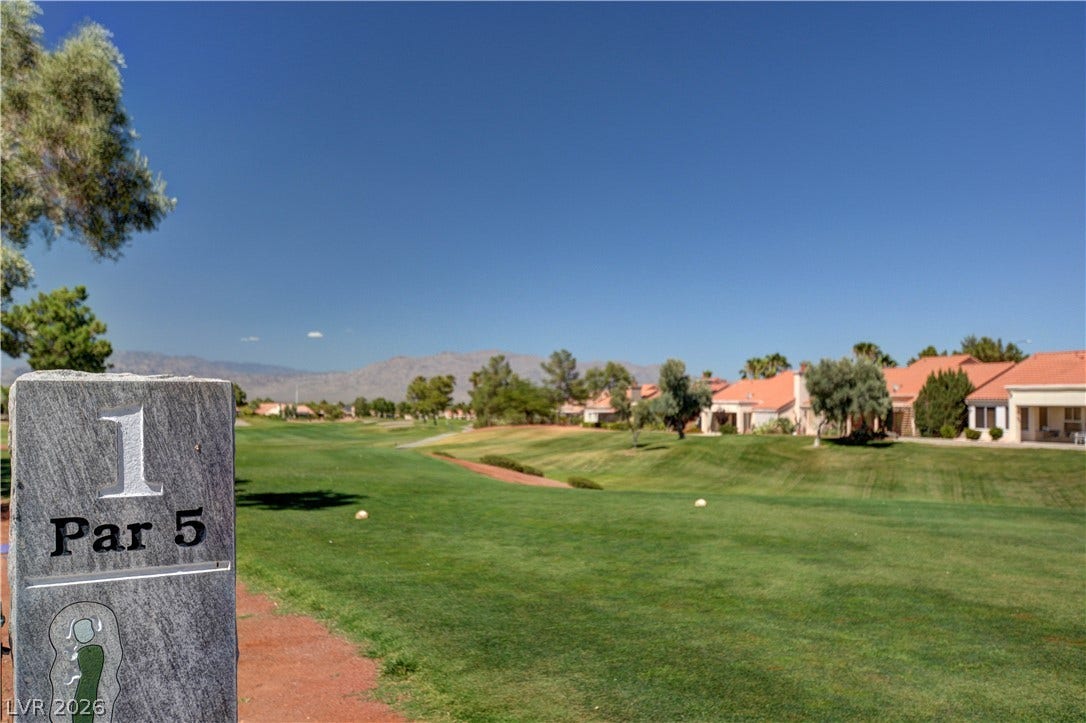 2621 Hanging Rock Drive, Las Vegas, NV 89134 Lush fairways and mountain backdrops create a picturesque setting bordering the community homes.