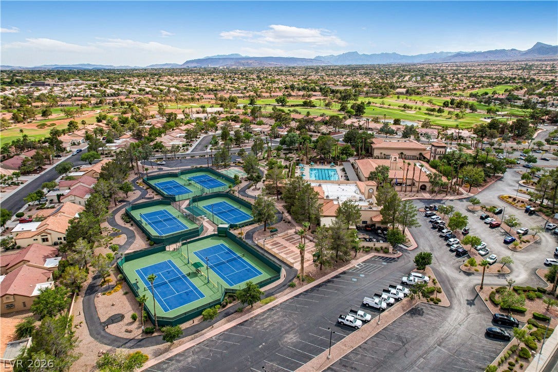 2621 Hanging Rock Drive, Las Vegas, NV 89134 Sprawling community amenities include professional tennis courts, a swimming pool, and an expansive clubhouse.
