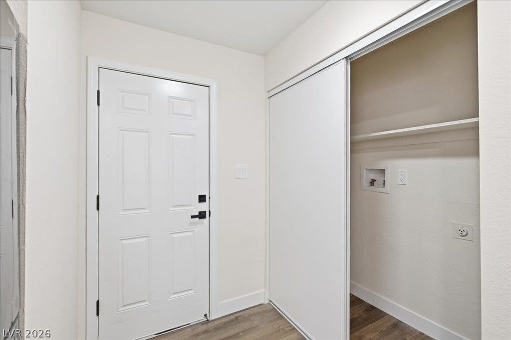 3912 Casa Grande Avenue, Las Vegas, NV 89102 An inviting entryway opens directly to a convenient laundry closet featuring sliding doors.