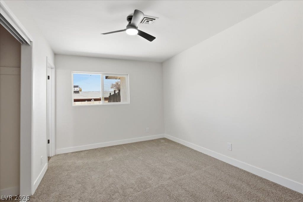 3912 Casa Grande Avenue, Las Vegas, NV 89102 Soft carpeting underfoot and a sliding glass window create a quiet, comfortable retreat.