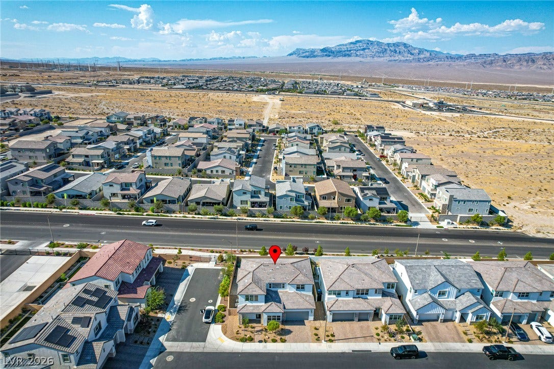 10226 Pleasant Knoll Avenue, Las Vegas, NV 89166 Distant desert mountains frame this planned residential neighborhood.