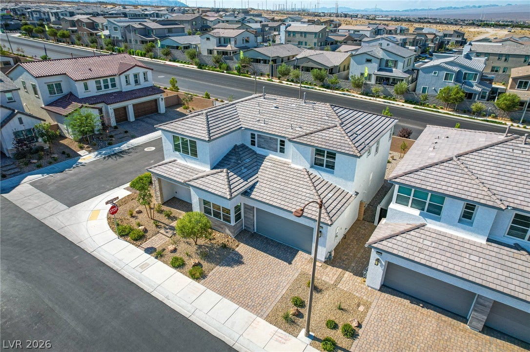 10226 Pleasant Knoll Avenue, Las Vegas, NV 89166 A contemporary two-story home in a suburban neighborhood.