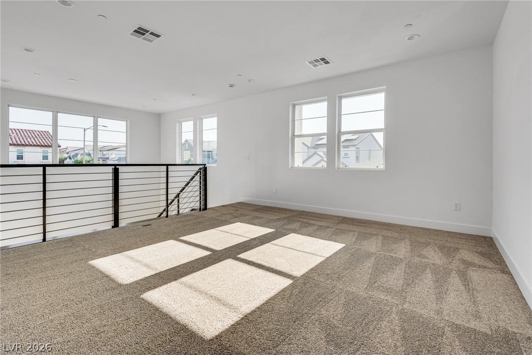 10226 Pleasant Knoll Avenue, Las Vegas, NV 89166 Bright & open upper-level loft space.