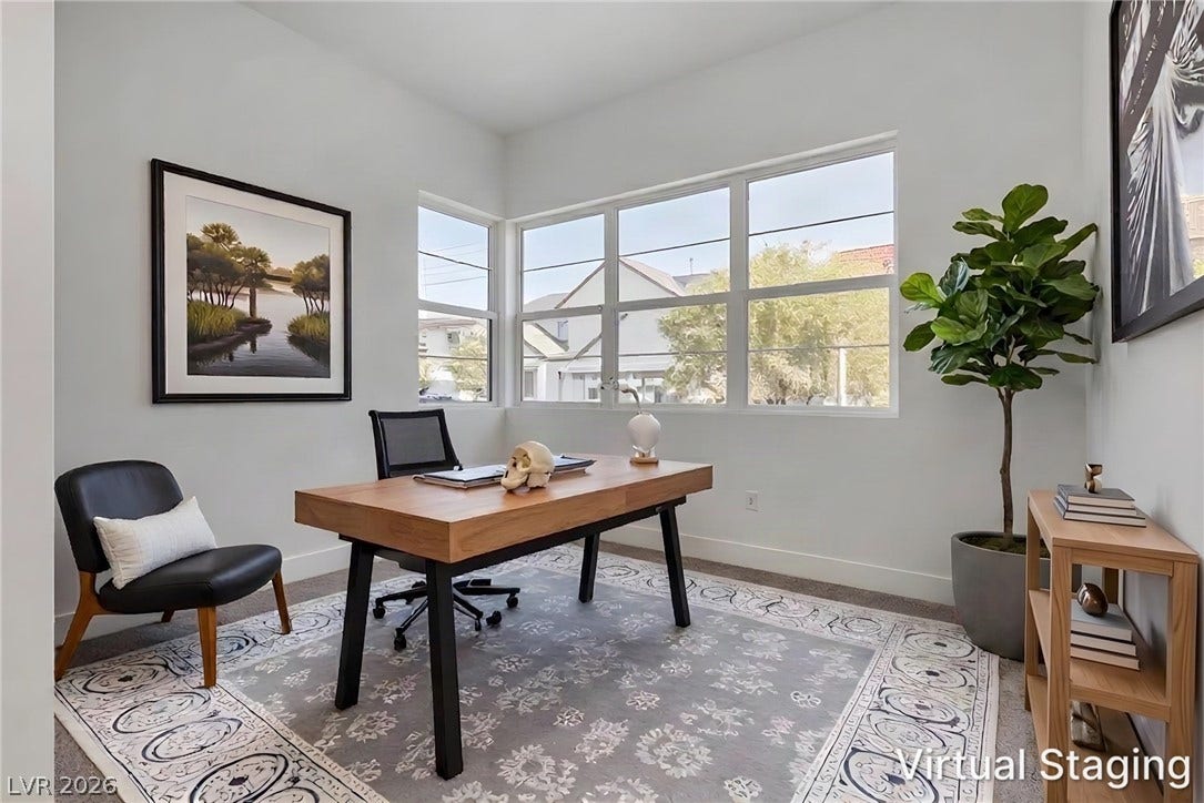 10226 Pleasant Knoll Avenue, Las Vegas, NV 89166 Virtually staged den into an office setting.