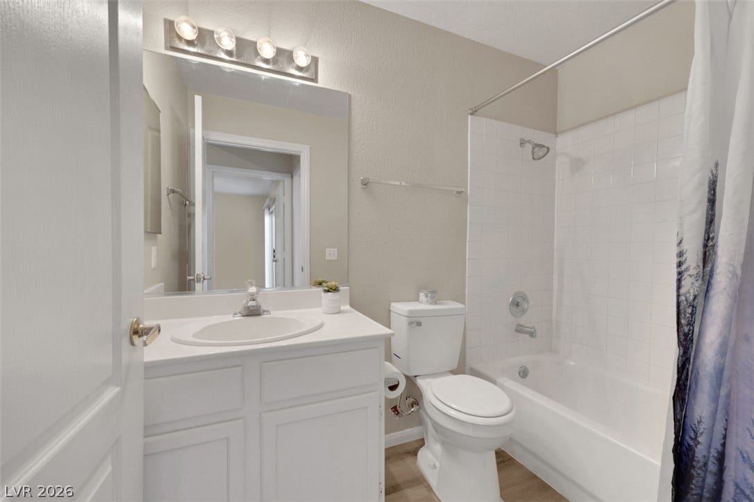 657 Anne Lane, #657, Henderson, NV 89015 Clean lines and classic tile work define this functional full bathroom.