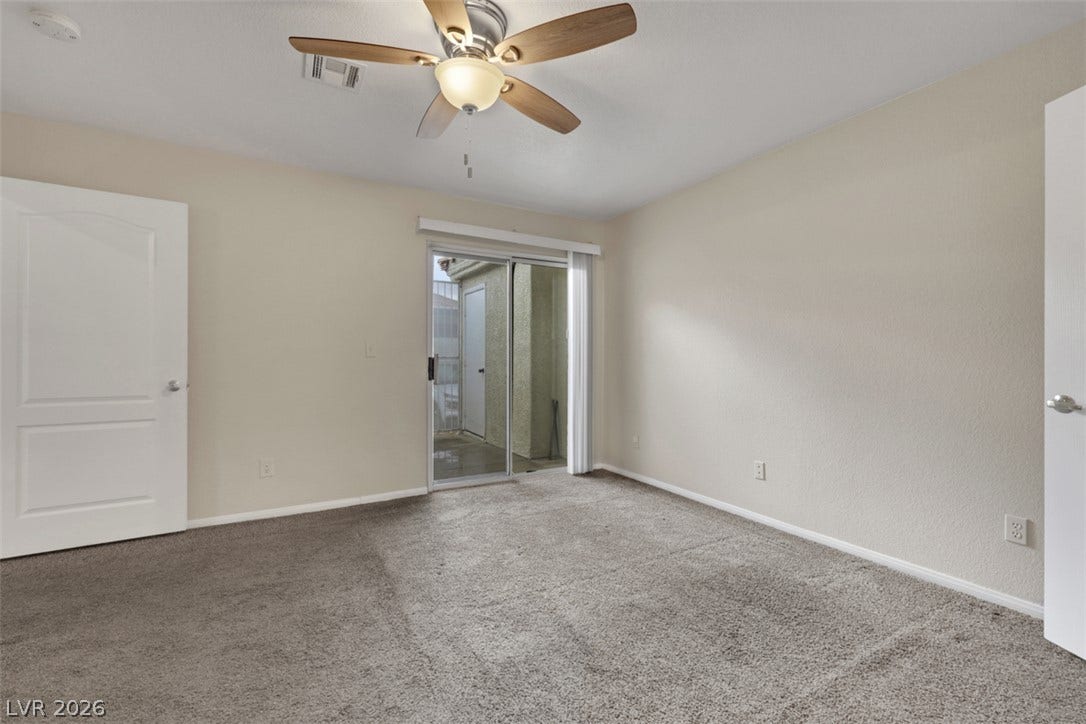 657 Anne Lane, #657, Henderson, NV 89015 Sliding glass doors open directly to a private outdoor patio space.