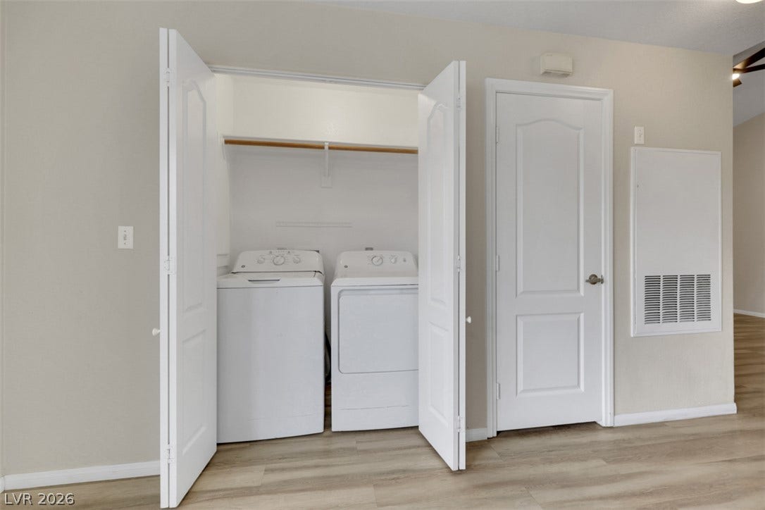 657 Anne Lane, #657, Henderson, NV 89015 Double doors open to reveal a convenient laundry closet situated off the main living space.