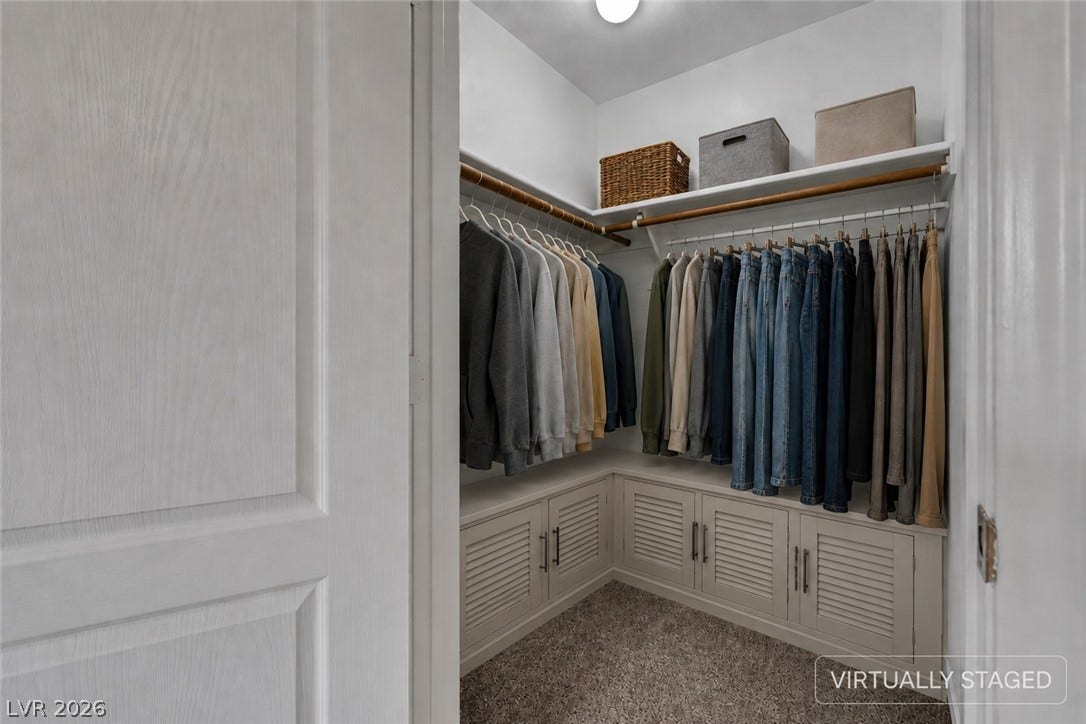 657 Anne Lane, #657, Henderson, NV 89015 A customized closet organization system optimizes storage space above plush carpeting.
