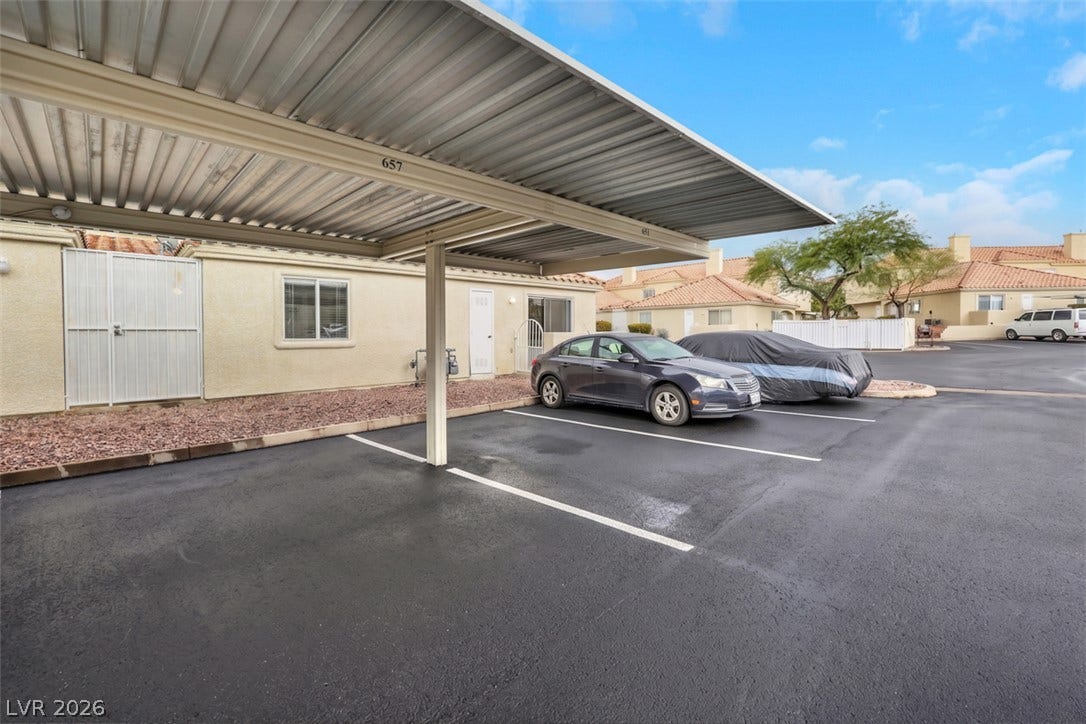 657 Anne Lane, #657, Henderson, NV 89015 A spacious covered carport provides convenient off-street parking just steps from the home.