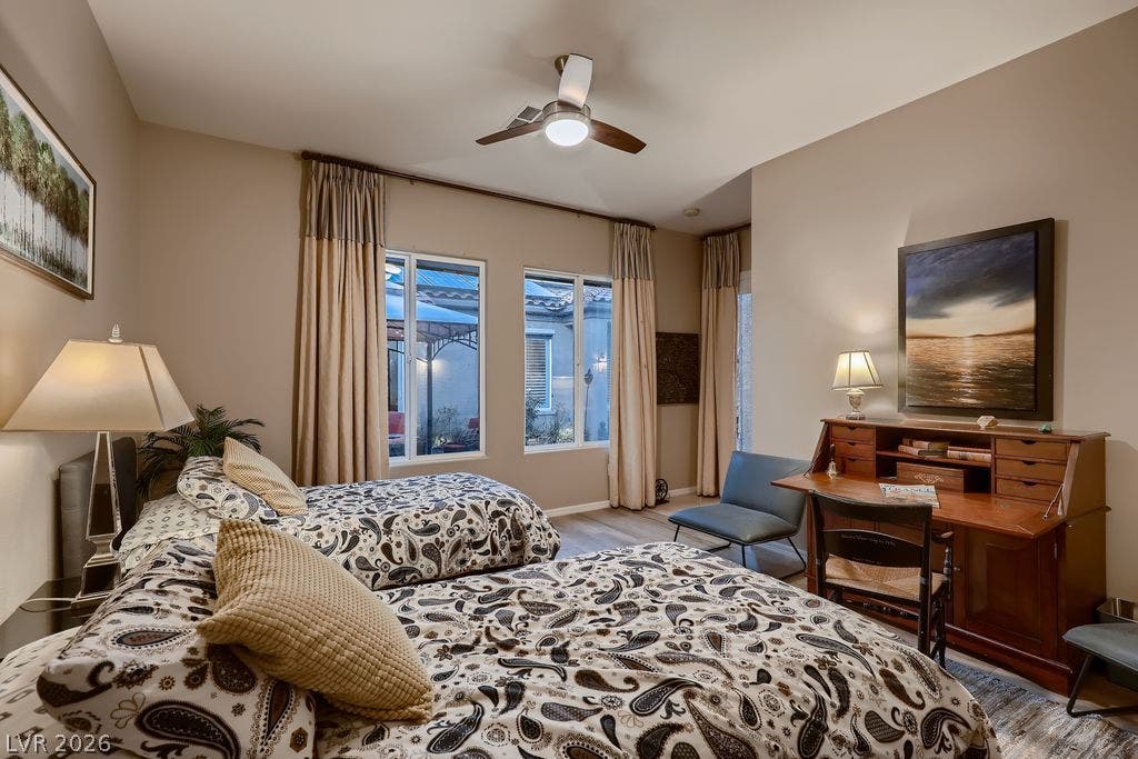 2284 Savannah River Street, Henderson, NV 89044 Tall windows fill this well-proportioned bedroom with natural light.